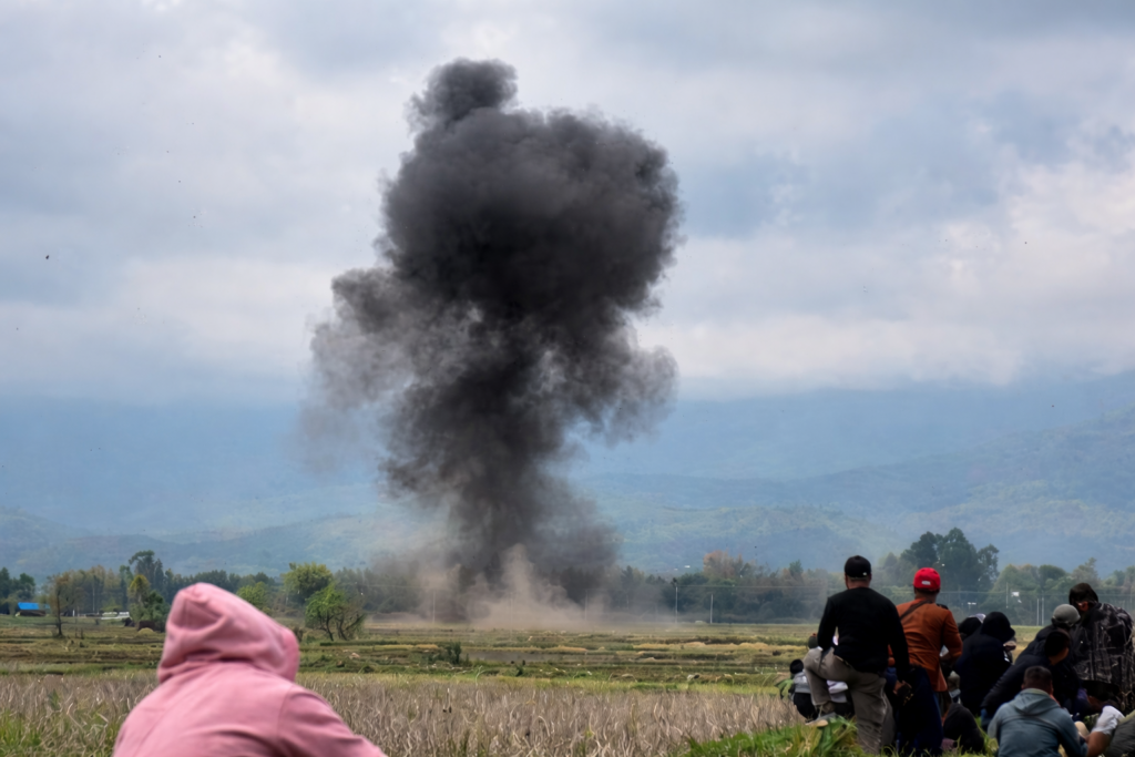 Four killed after violence flares in India's Manipur state explosion and smoke over open field